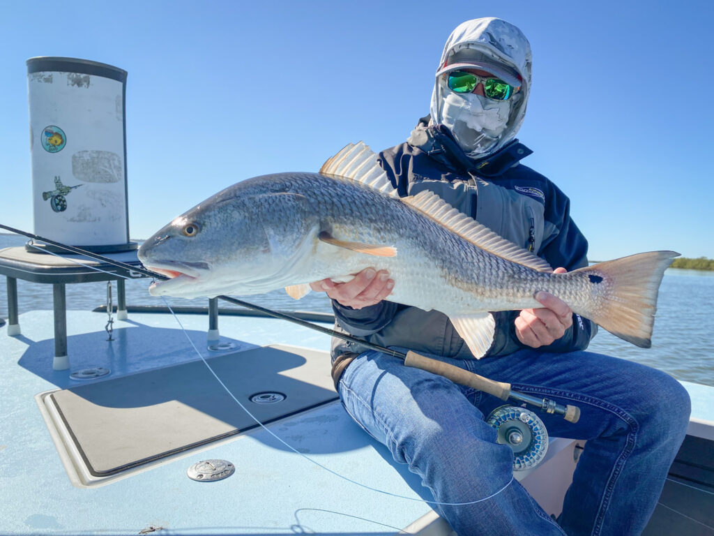 redfish, redfish on fly, sightfishing, mosquito lagoon, indian river lagoon, new smyrna beach, new smyrna beach fly fishing, flats fishing, backcountry fishing, fishing flats, sight fishing the flats, shallow water sight fishing, fly fishing, saltwater fly fishing, tailng redfish, seatrout on fly, black drum on fly, snook on fly, tarpon on fly, florida sight fishing, florida fly fishing, winter redfishing